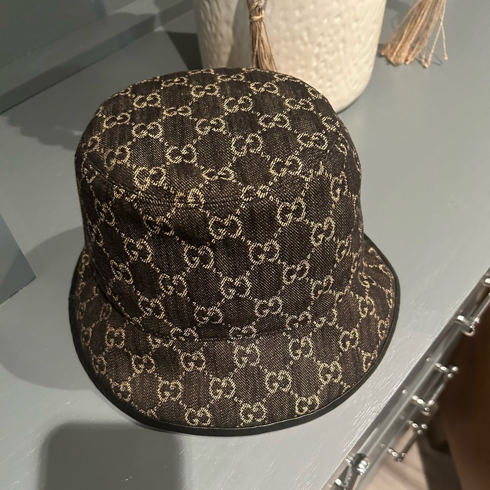 Gucci bucket hat purchased at Gucci store, like brand new, worn 1 time